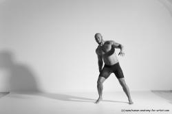 Underwear Gymnastic poses Man Black Muscular Bald Dancing Dynamic poses Academic